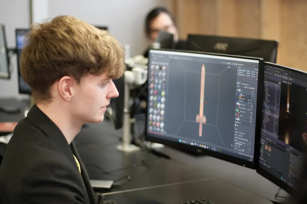 Student working in the digital design suite at HCA