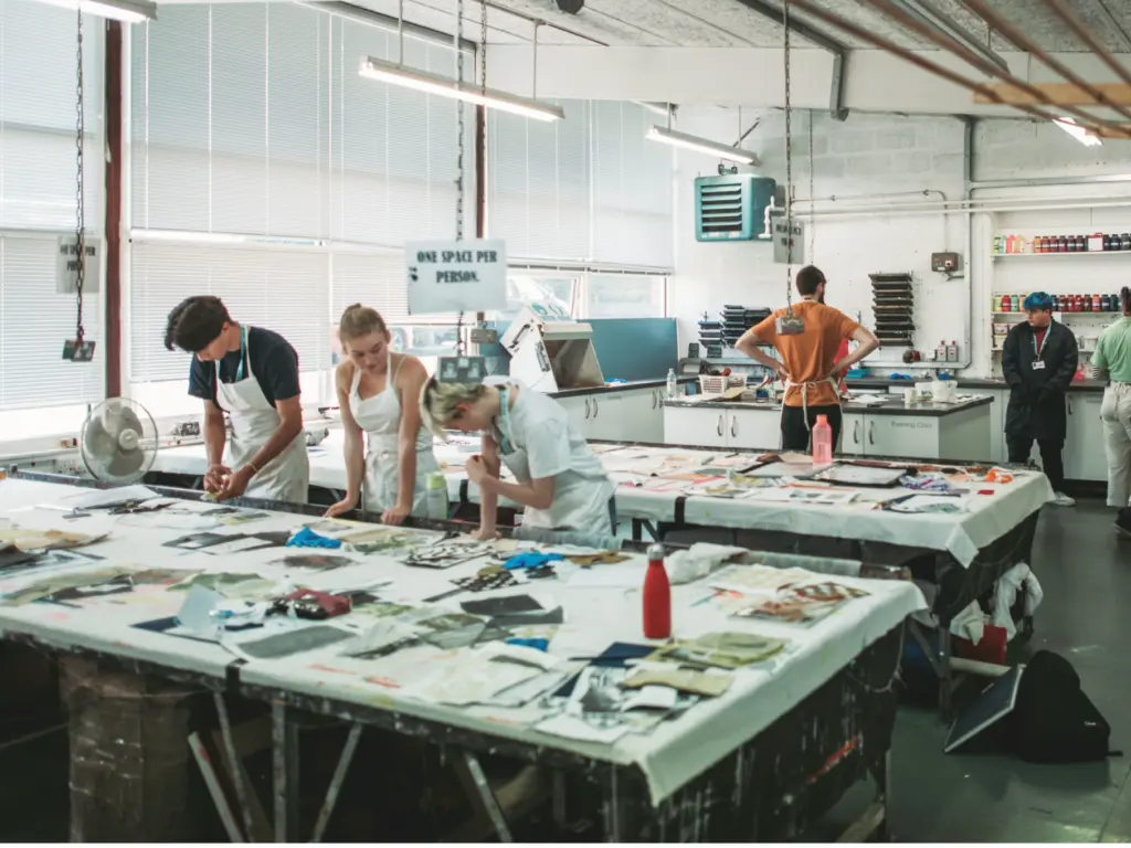 Several HCA students creating in the workshops at the Folly Lane Campus.