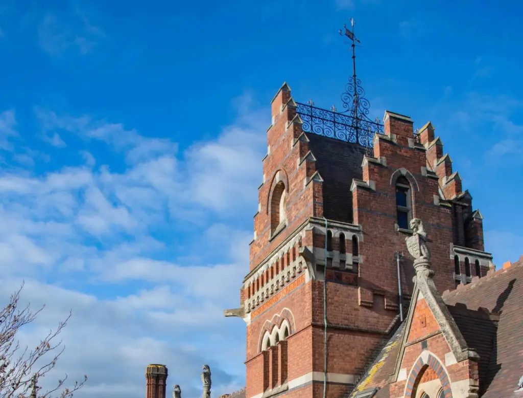 An ornate brick building viewed from the second floor
