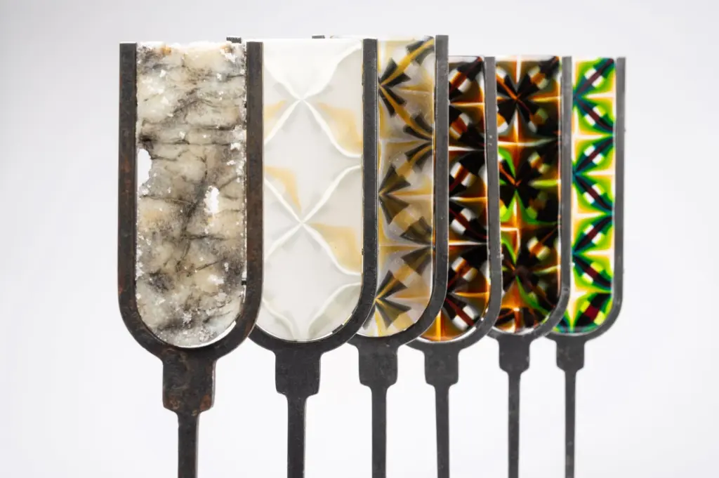 Glass in forged metal.