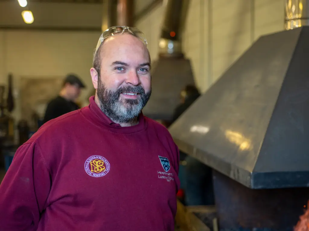 Picture of Adam at the forge.