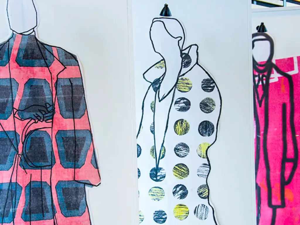 Large-scale fashion illustrations layered getting further away. They are brightly and boldly patterned.
