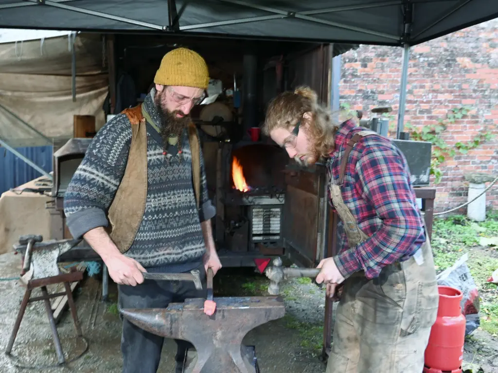 Simon Bushell and Joe Robinson demonstrating hot metal forging (photos. Simon Pizzey)