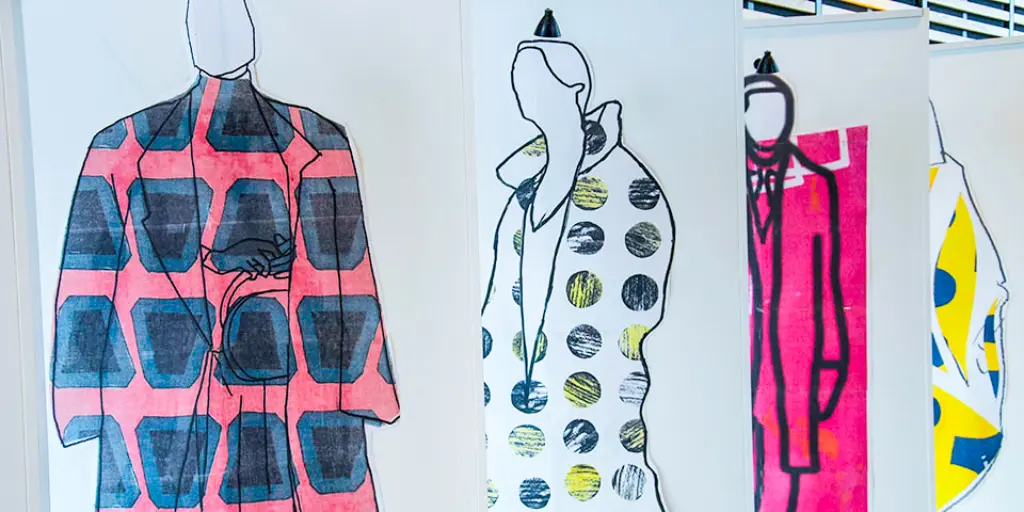 Large-scale fashion illustrations layered getting further away. They are brightly and boldly patterned.